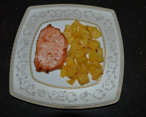 cotlet de porc gata in farfurie