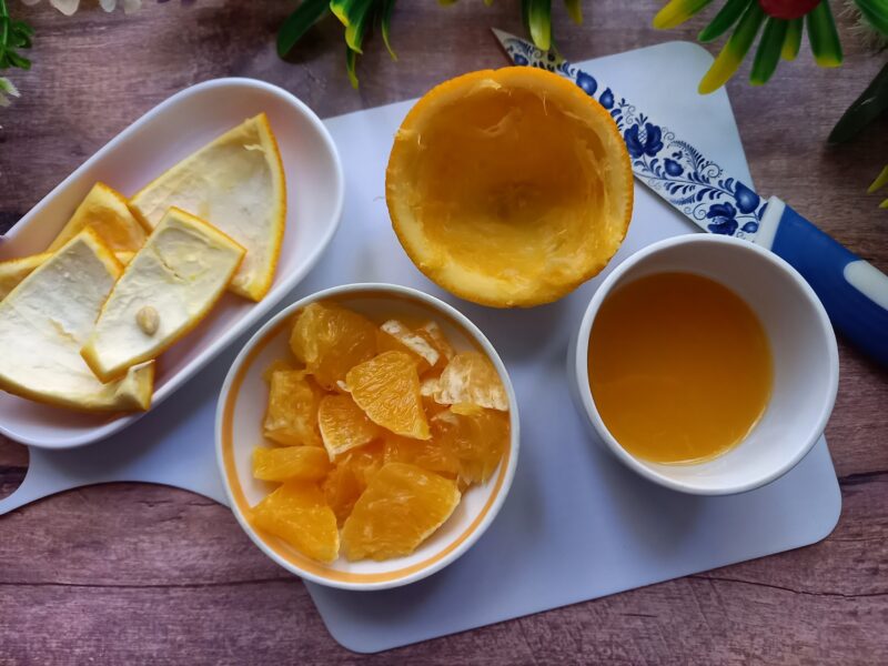 Taiati portocala in jumatate