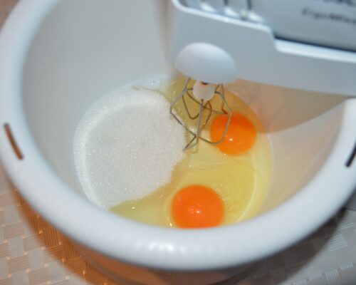 Add the eggs and sugar