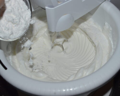Finally, add the powdered sugar and beat