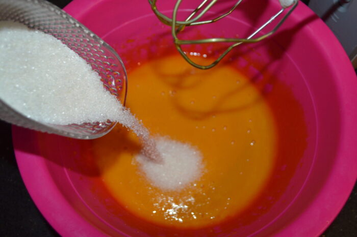 Beat the egg yolks with a mixer