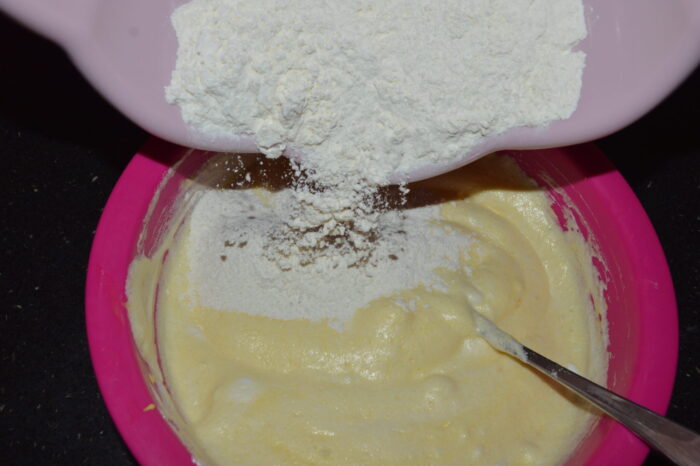 Then gradually pour in the egg whites and egg yolk mixture