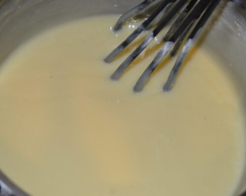 Then stir it well with a whisk to dissolve the chocolate