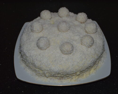 Finally, place 8 raffaello candies on the sides