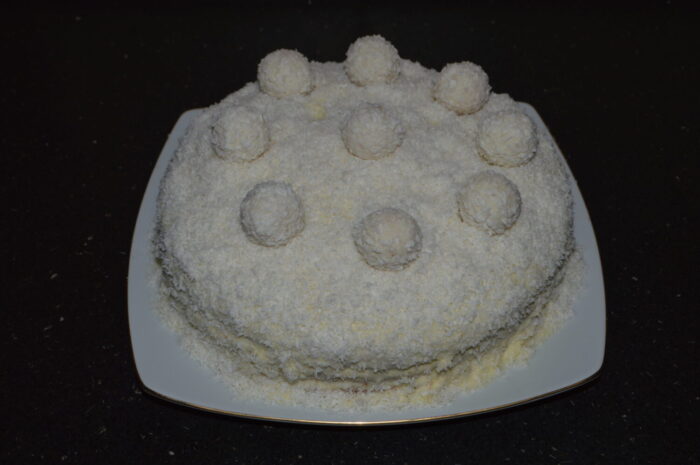 Finally, place 8 raffaello candies on the sides