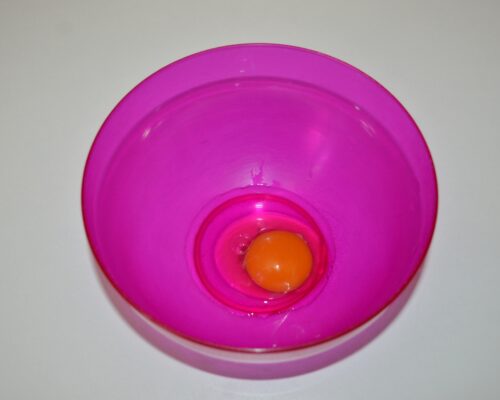Break an egg in a bowl