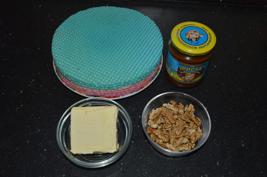 Ingredients displayed: waffle sheets, butter, condensed milk, nuts