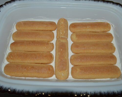 Add the second layer of ladyfingers