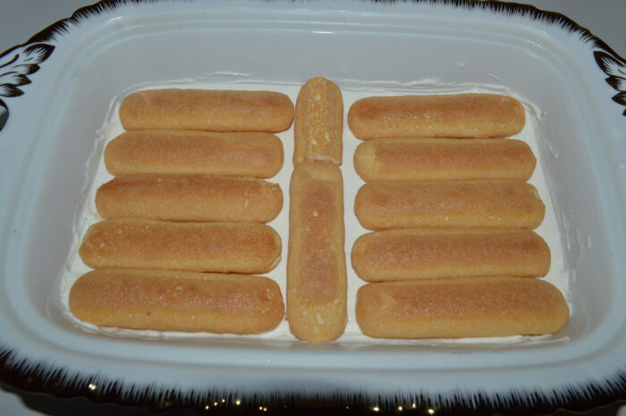 Add the second layer of ladyfingers