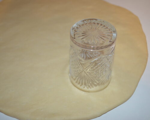 Use a glass to form a circle.