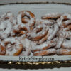 Donuts sprinkled with powdered sugar