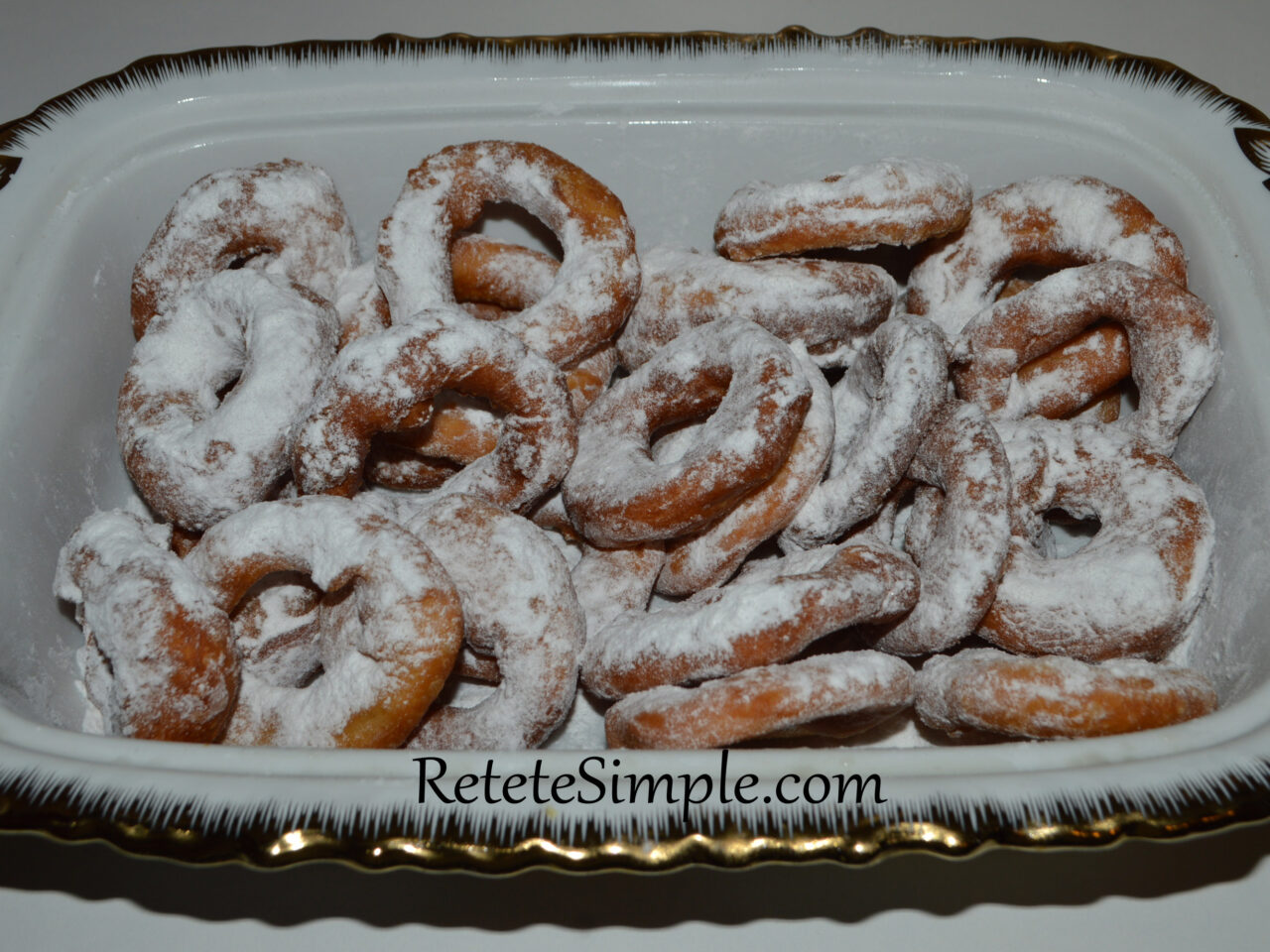 Donuts sprinkled with powdered sugar