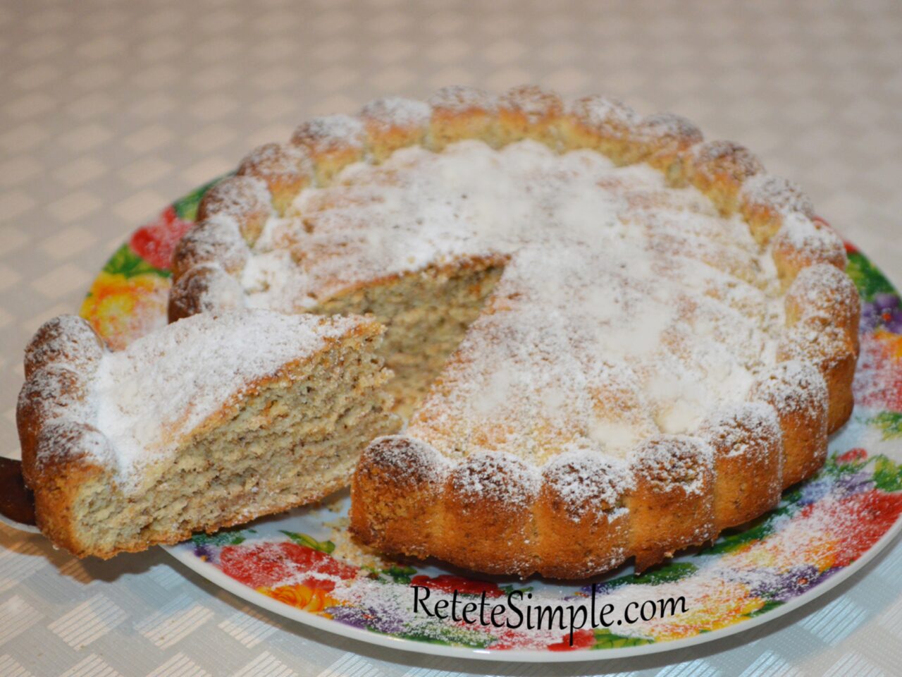 Slice of walnut cake showing soft texture