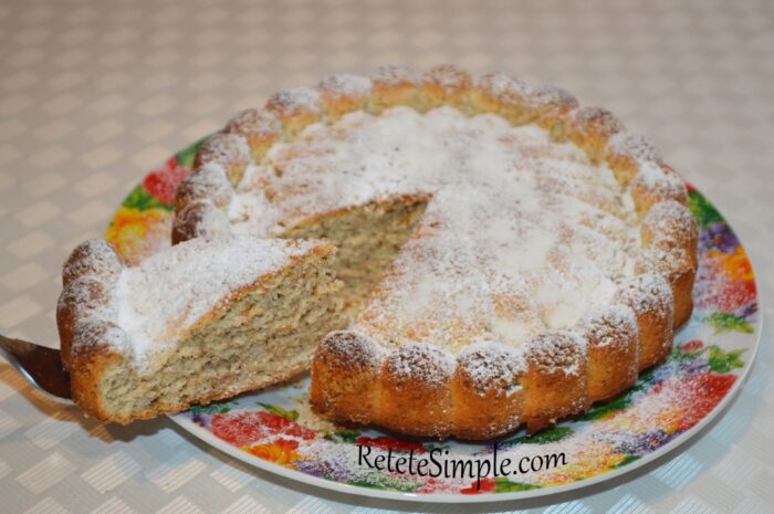 Slice of walnut cake showing soft texture