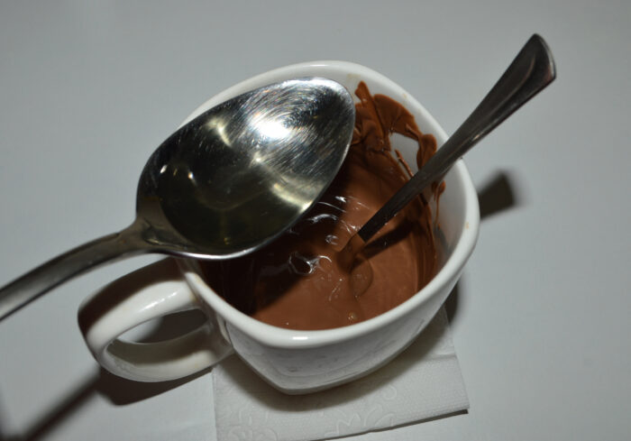 Pour the melted chocolate into a cup