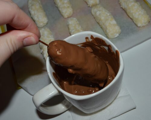 Turn it so that the cheese is covered with chocolate
