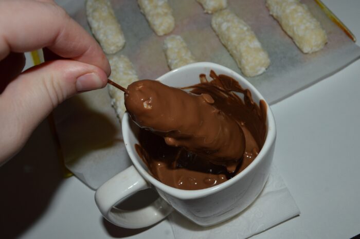 Turn it so that the cheese is covered with chocolate