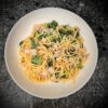One‑pot spaghetti with crispy bacon, broccoli florets, and creamy sauce