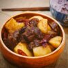 Tender beef pieces in soy‑ginger sauce with crispy potatoes