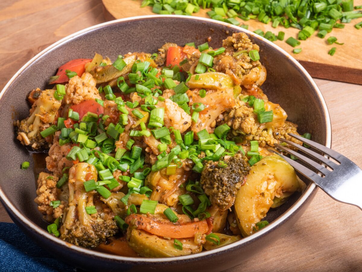 Close‑up of stir‑fried broccoli and cauliflower with star anise