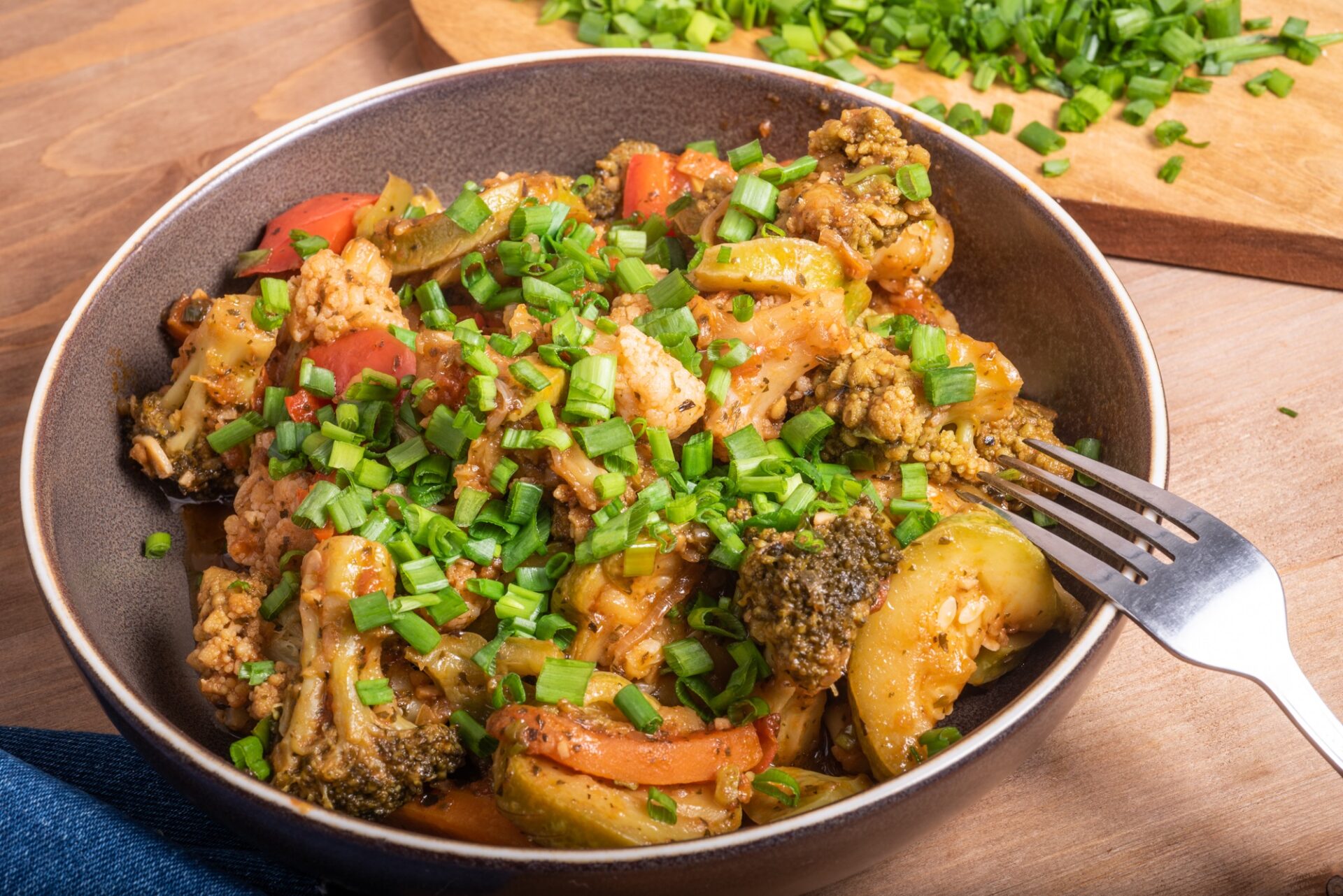 Close‑up of stir‑fried broccoli and cauliflower with star anise