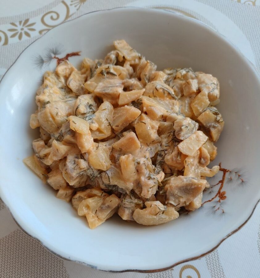 Close-up of mushrooms in creamy sauce with garlic