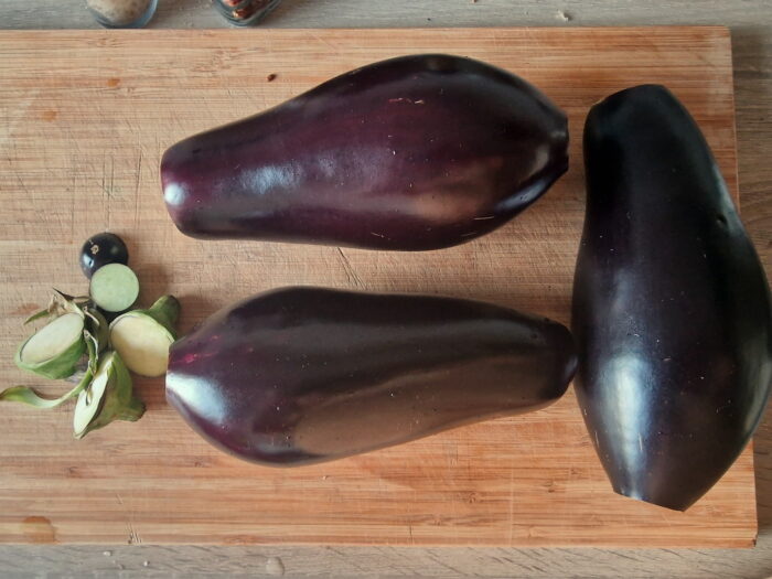 Wash eggplants and cut