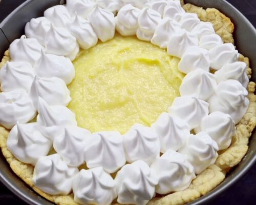 Golden meringue and lemon filling on a delicate shortcrust base