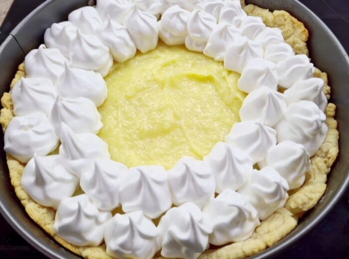 Golden meringue and lemon filling on a delicate shortcrust base