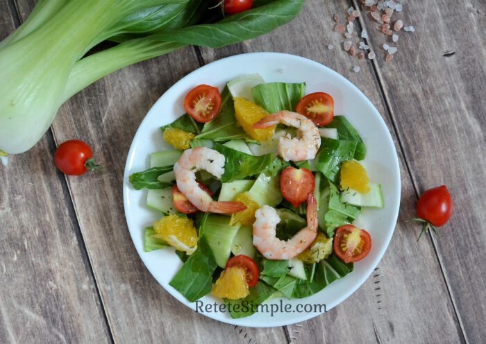Healthy seafood salad featuring shrimp, orange, and bok choy