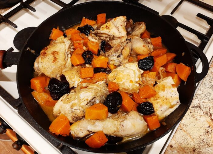 Rinse the dried plums in cold water and place them in the pan