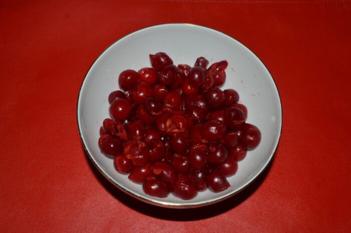 Wash the sour cherries