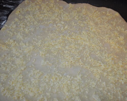 Place the filling on the rolled-out dough
