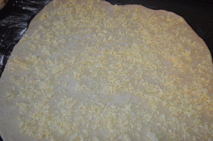 Place the filling on the rolled-out dough