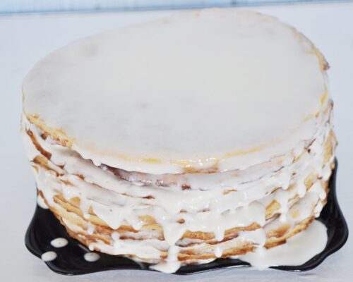 Spread the sour cream generously on the finished cake layers
