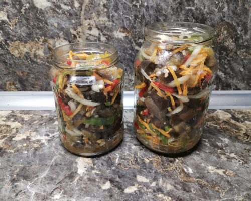 lay them out tightly in sterilized jars