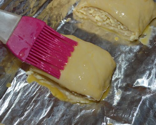 brush the pastry with a kitchen brush