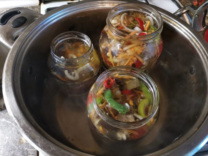 Set out the jars with the vegetables