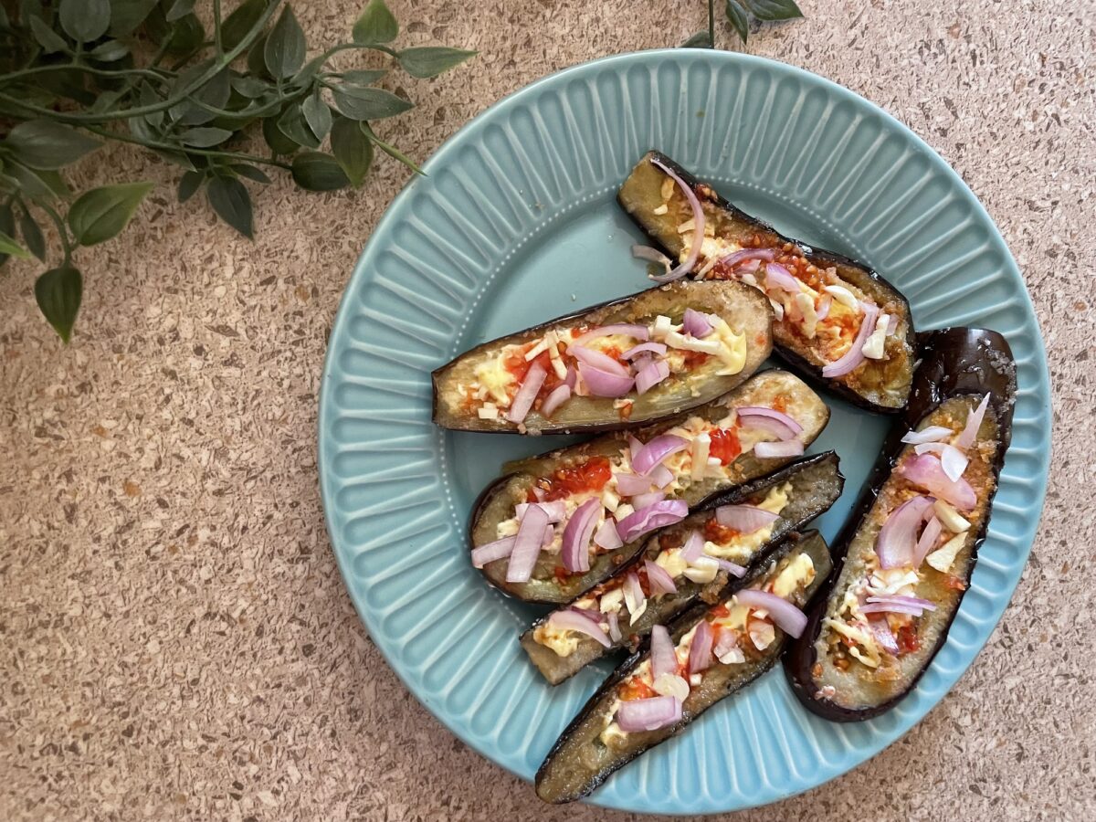 Eggplant topped with creamy mascarpone and fresh tomato