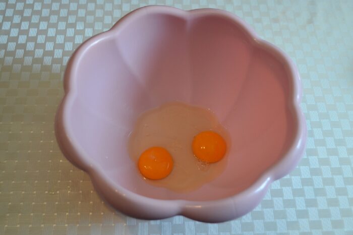 Break the eggs into a deep bowl