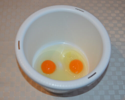 Break the eggs into a deep bowl