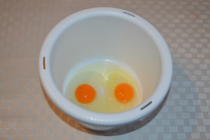 Break the eggs into a deep bowl