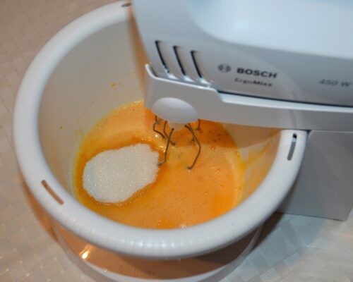 add the eggs and sugar to a deep bowl