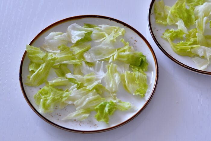 Wash the lettuce leaves