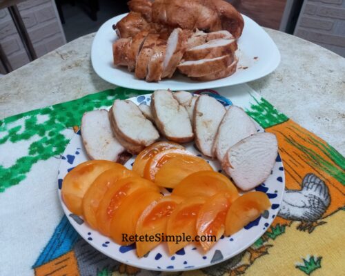 Cold sliced chicken ham served on platter