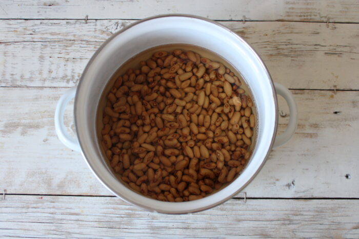 The beans should be washed and covered with cold water