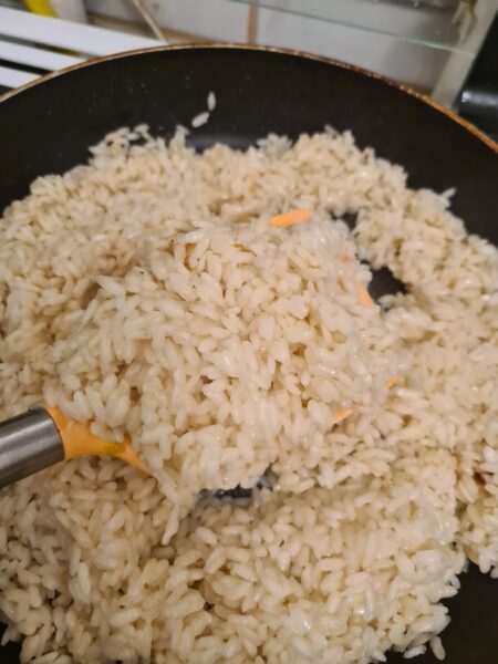 pour the water into the rice and simmer