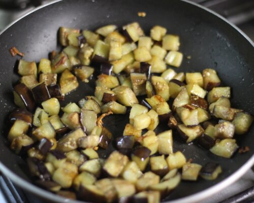 Cut the eggplants into cubes and fry