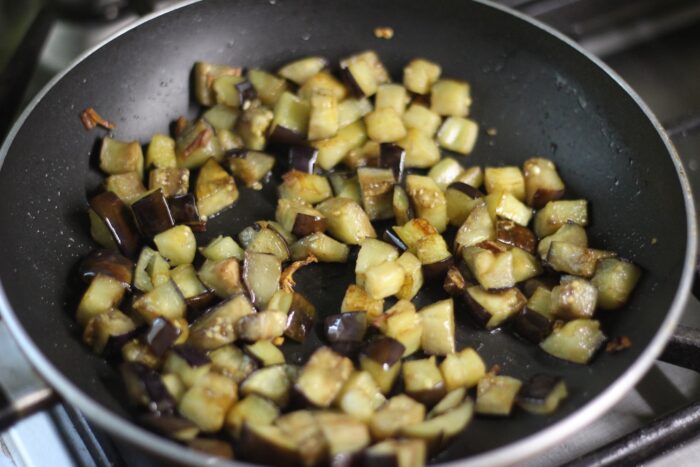 Cut the eggplants into cubes and fry