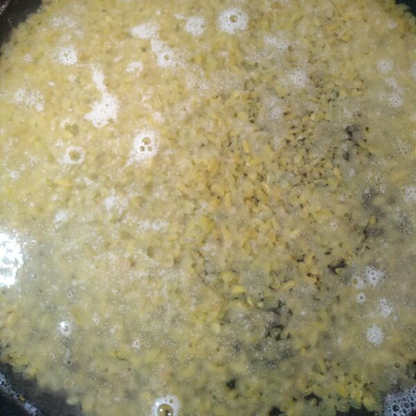 Add the water, cover the pan